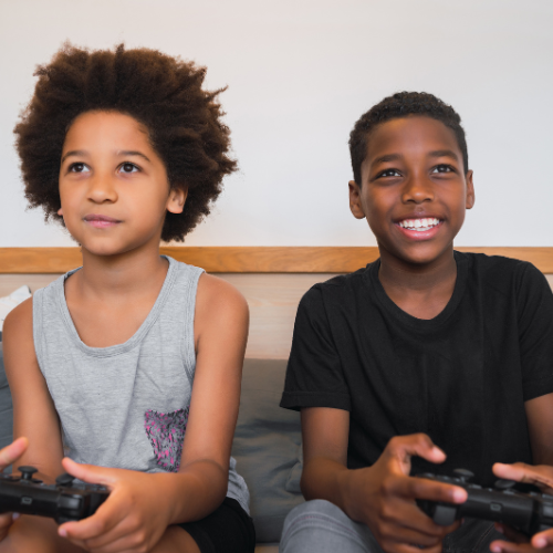 Kid creating a game world in Kiddo Studio